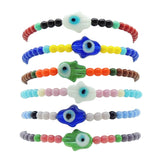 Dana Levy Glass Hamsa Hand Amulet Glass Bead Mix Bracelet - Stack of bracelets in a variety of colour mixes.