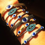 Dana Levy mother of pearl evil eye trio cuff bracelet - on Wrist with Variety of Evil Eye Bangles and Cuffs