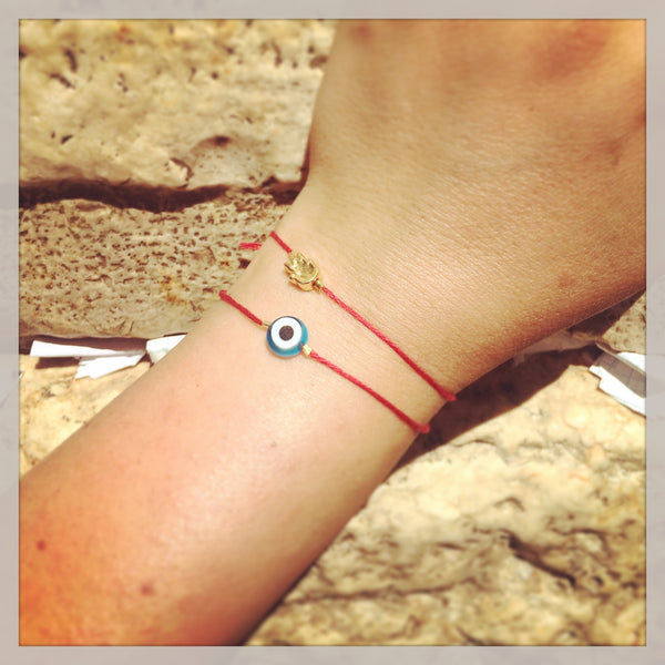 Red bracelet with eye meaning top