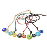 Dana Levy Evil Eye Disc Charm Duo Leather Cord Necklaces in a variety of contrasting colours. 
