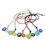 Dana Levy Evil Eye Disc Charm Duo Leather Cord Necklaces in a variety of contrasting colours. 