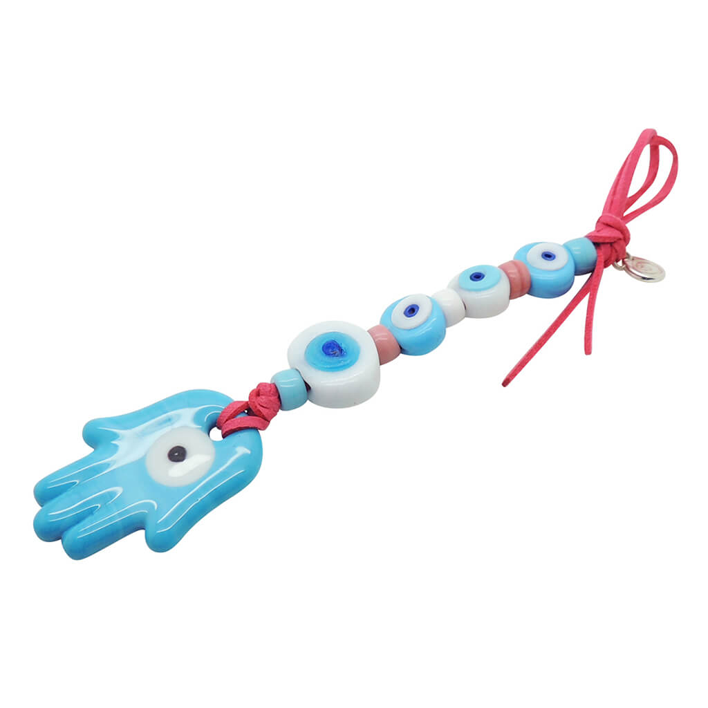 Dana Levy Hamsa Hand Talisman Wall Hanging in opaque turquoise with white and turquoise evil eyes. 