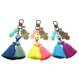 Dana Levy Mano Fico Hamsa Hand Evil Eye Trio Charm Tassel Bag Charm Trio with Silver Hamsa Hand Evil Eye Charms in Royal Blue, Yellow and Cornflower Blue.. 