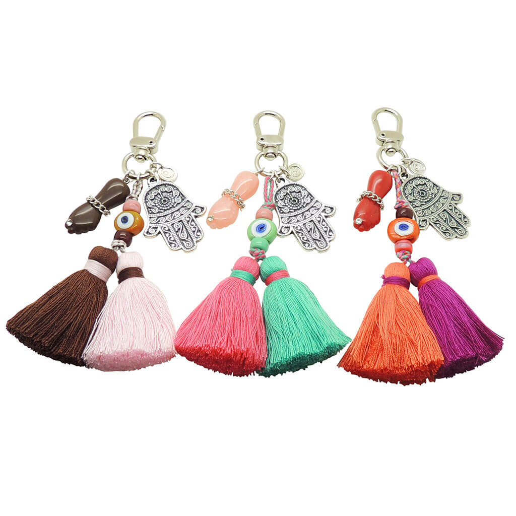 Dana Levy Mano Fico Hamsa Hand Evil Eye Trio Charm Tassel Bag Charm Trio with Silver Hamsa Hands and Brown Mint and Orange Evil Eye Charms. 