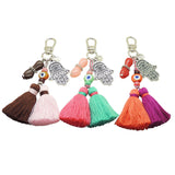 Dana Levy Mano Fico Hamsa Hand Evil Eye Trio Charm Tassel Bag Charm Trio with Silver Hamsa Hands and Brown Mint and Orange Evil Eye Charms. 