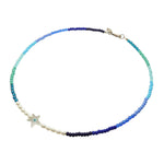 Dana Levy Ocean Pearl Amulet Bead Necklace  with a mother of pearl starfish charm with evil eye. 