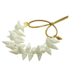 Dana Levy Seashell Treasure Charm Cord Bracelet with a Gold Plated Shell Charm and Metallic Gold Faux Leather Cord
