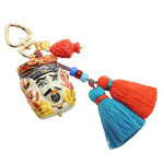 Dana Levy Sicilian Testa di Moro Charm Trio Bag Charm - Male Head with Red Blue Double Tassel and Red Pine Cone Charm 