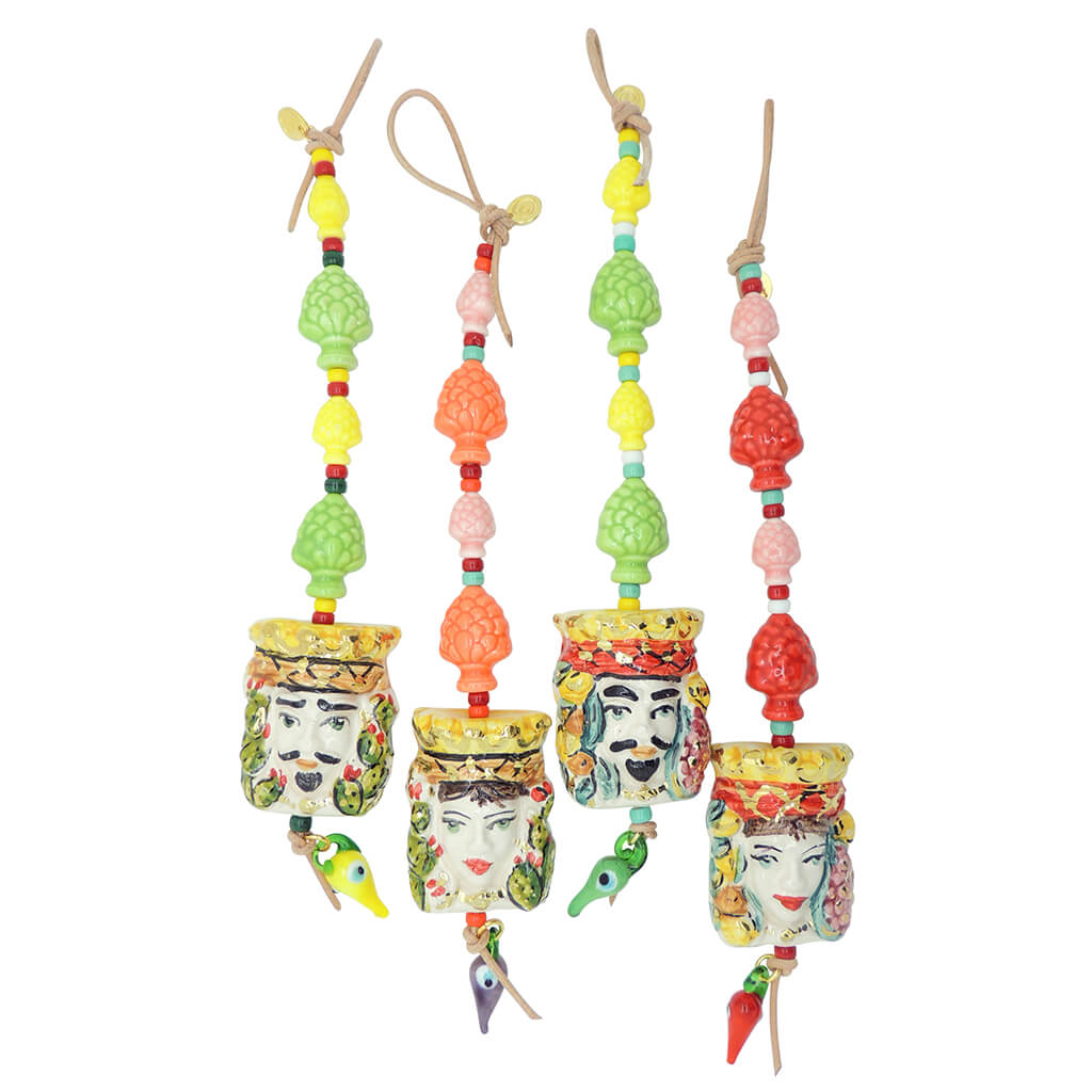 Dana Levy Sicilian Testa di Moro Charm Wall Hangings Group of four in male and female heads in a variety of colours. 