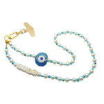 Dana Levy faux pearl phone charm strap with turquoise evil eye charm and beads, and CIAO alphabet cube beads, and a gold plated clasp and logo phone clip on a white background.