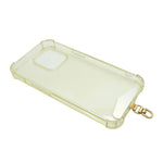 Dana Levy clear phone case with back of gold metal phone charm strap card on a white background.