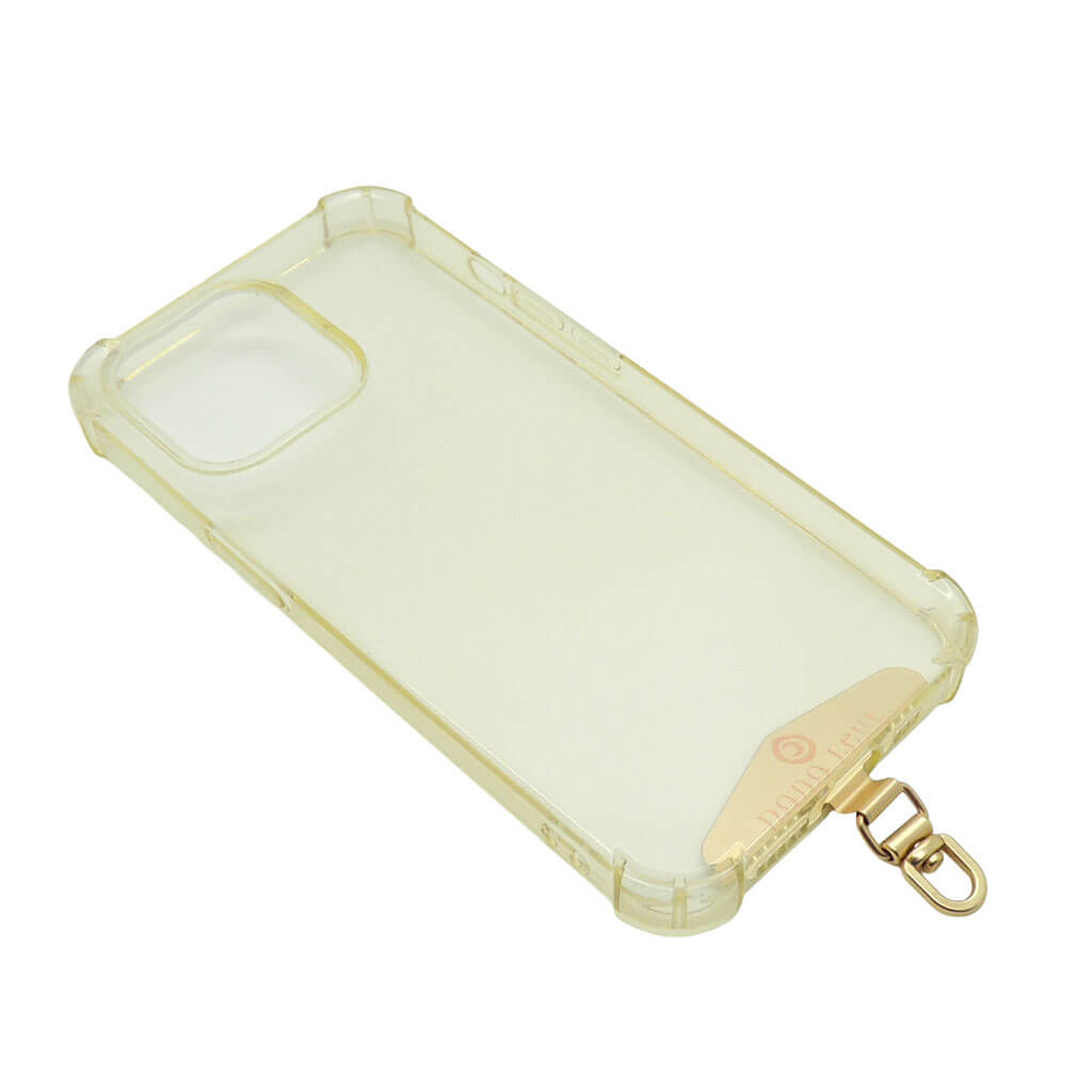 Dana Levy clear phone case with front of gold metal phone charm strap card on a white background.