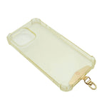 Dana Levy clear phone case with front of gold metal phone charm strap card on a white background.