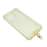 Dana Levy clear phone case with front of gold metal phone charm strap card on a white background.