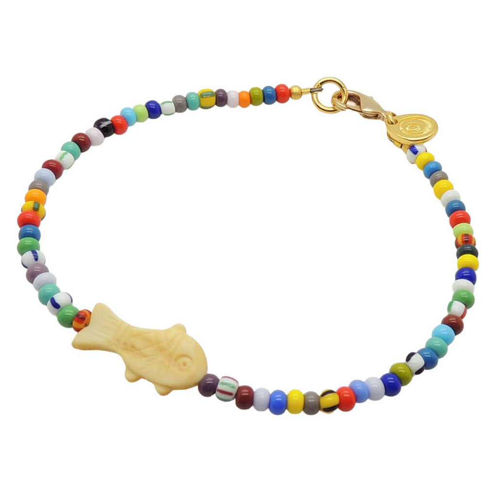 Dana Levy cream bone fish charm balagan glass bead mix anklet with a gold plated clasp on a white background. 