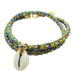 Dana Levy diamante cowrie shell charm braid cord bracelet in blue green colours on a white background. 