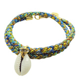 Dana Levy diamante cowrie shell charm braid cord bracelet in blue green colours on a white background. 