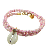 Dana Levy diamante cowrie shell charm braid cord bracelet in pink colour mix on a white background. 