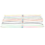 Dana Levy set of colourful cord string bracelets with evil eye amulet charms on a white background