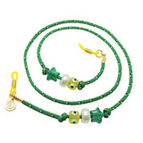 Dana Levy green sunglasses cord with colourful lucky charms and yellow toggles on a white background