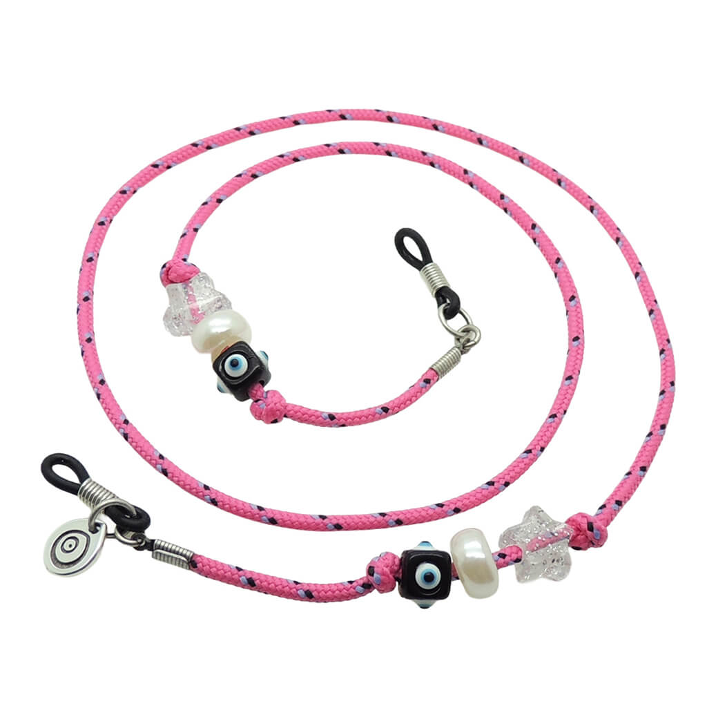 Dana Levy pink cord eyeglass holder with decorative lucky charm beads on a white background