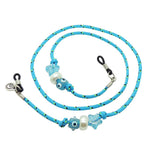 Dana Levy Turquoise blue eyeglass cord with decorative charm beads on a white background