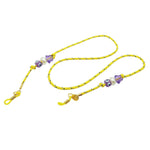 Dana Levy yellow sunglasses cord with colourful evil eye and star beads and gold clasp on a white background