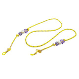 Dana Levy yellow sunglasses cord with colourful evil eye and star beads and gold clasp on a white background