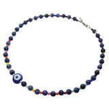 Dana Levy evil eye amulet necklace with multicoloured rainbow and sodalite gemstone beads on a white background.