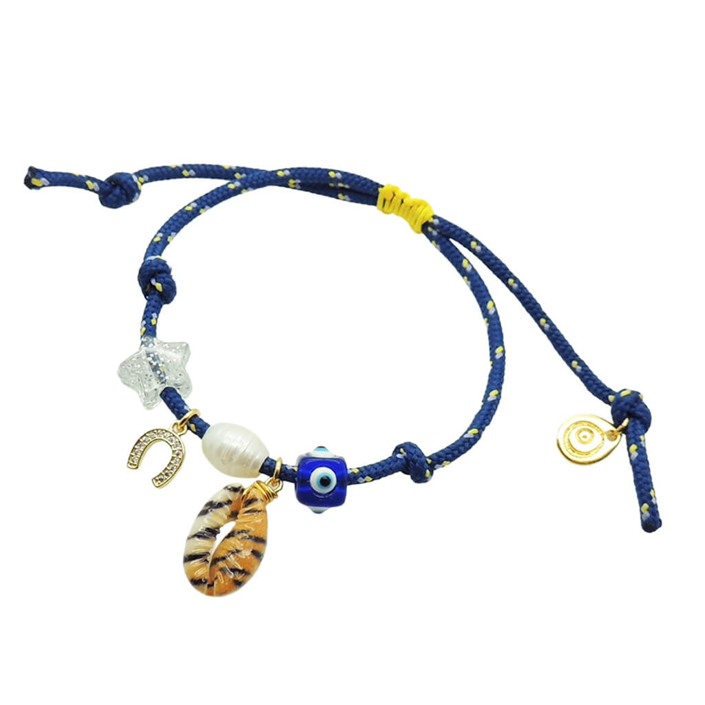 Dana Levy navy blue nautical cord bracelet with various lucky charms on a white background.