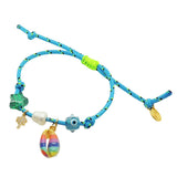 Dana Levy turquoise nautical cord bracelet with various charms on a white background.