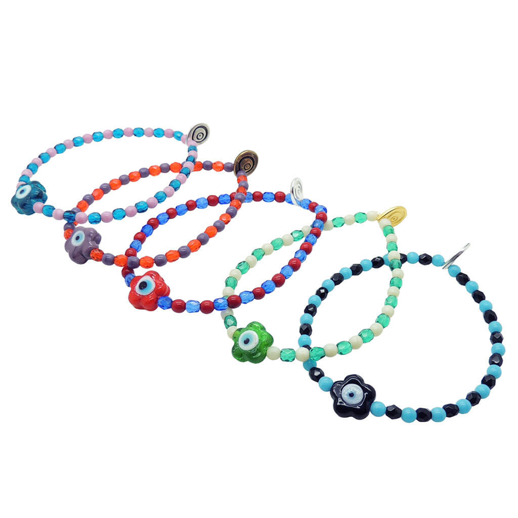Dana Levy glass evil eye flower charm glass bead mix bracelets in a variety of colour mixes on a white background. 