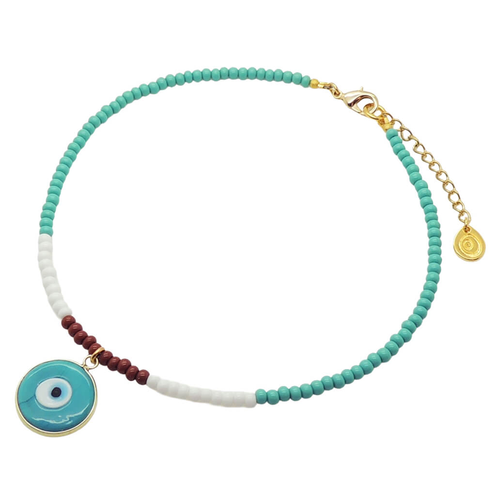 A Dana Levy beaded choker with teal, brown and white glass beads, a round teal evil eye pendant, and gold-tone hardware including a clasp and extender chain on a white background.