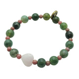 Dana Levy jade heart charm gemstone beaded bracelet with moss agate and pink rhodonite beads on a white background.