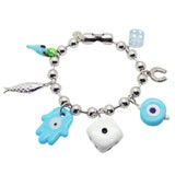 Dana Levy maxi lucky charms ball chain bag charm with silver chain and opaque turquoise lucky charms on a white background. 