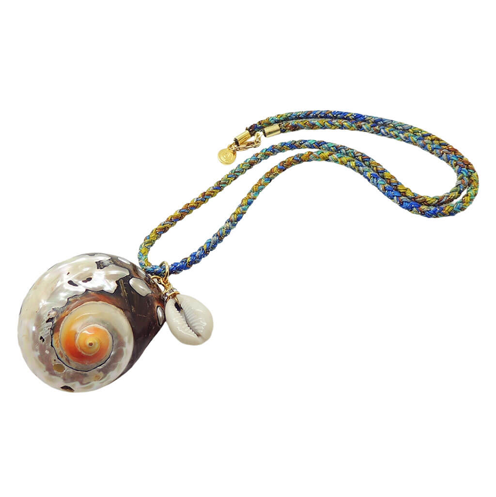 Dana Levy large spiral seashell charm with a small cowrie shell charm on a blue green and brown braid cord necklace side view on a white background. 