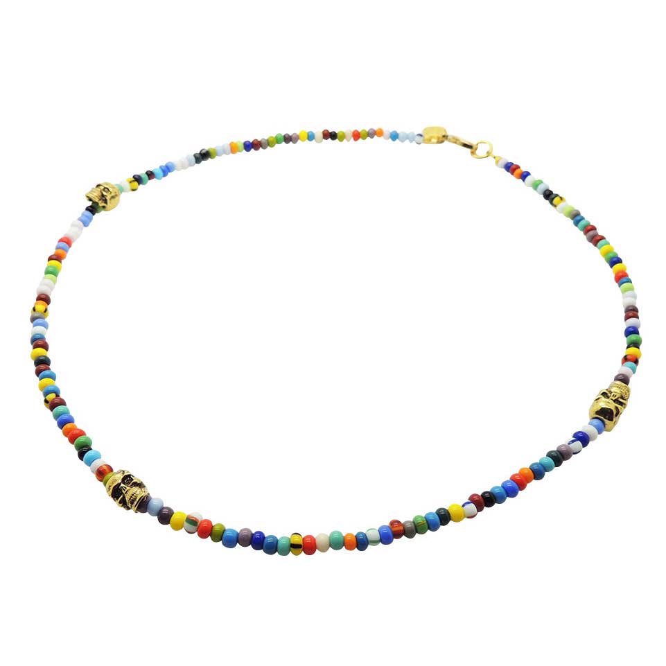 a gold plated skull charm trio multicolour glass bead mix necklace on a white background by Dana Levy  
