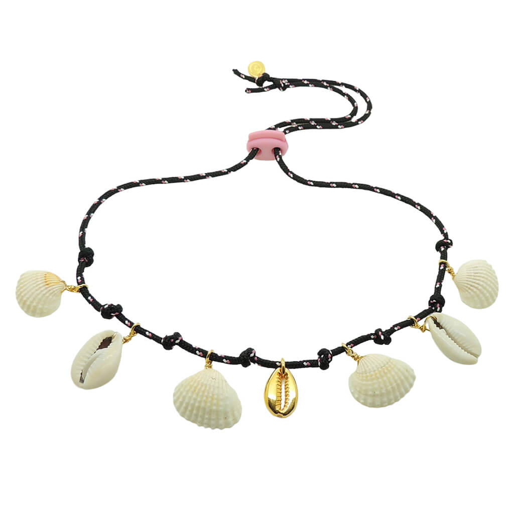 Dana Levy black cord necklace with gold plated and shell pendants on a white background