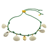 Dana Levy green nautical cord necklace with gold and natural seashells on a white background