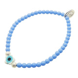Dana Levy cornflower blue glass bead bracelet with a white evil eye star charm and shiny silver stardust beads. 