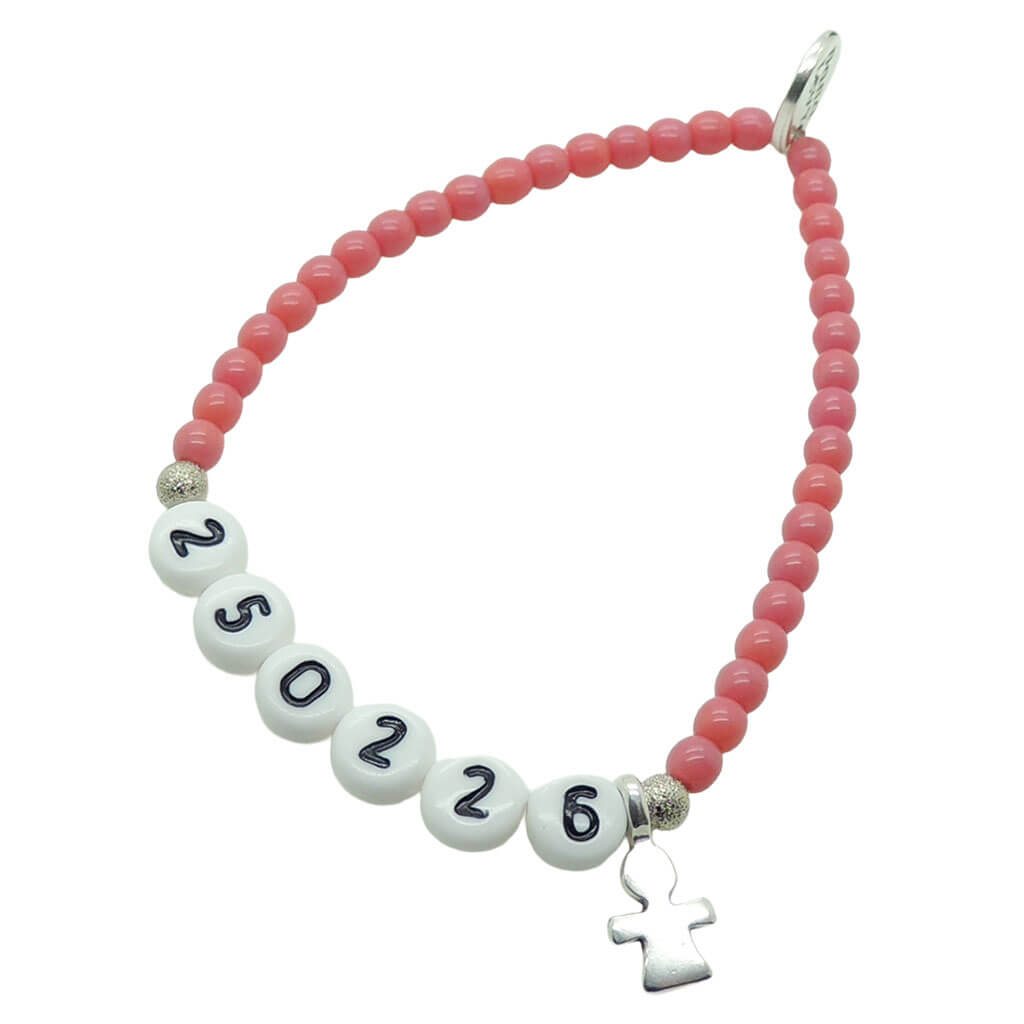 A Dana Levy dark rose newborn baby milestone glass bead bracelet with birth date in white acrylic letters and a silver plated mini girl icon charm, on a white background. 