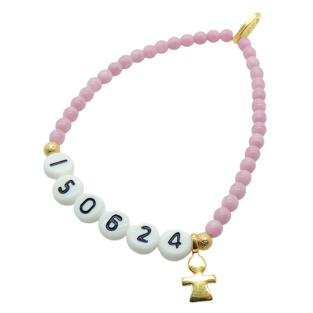 A Dana Levy light pink newborn baby milestone glass bead bracelet with birth date in acrylic letters and a gold plated mini girl icon charm, on a white background. 