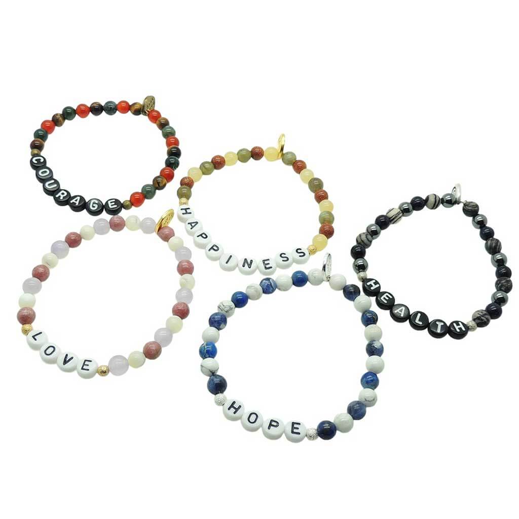 Dana Levy set of beaded semi precious gemstone bracelets with inspirational words on a white background