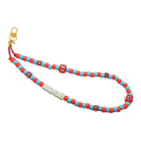 Dana Levy CIAO beaded phone charm strap with colourful beads and a gold clip on a white background