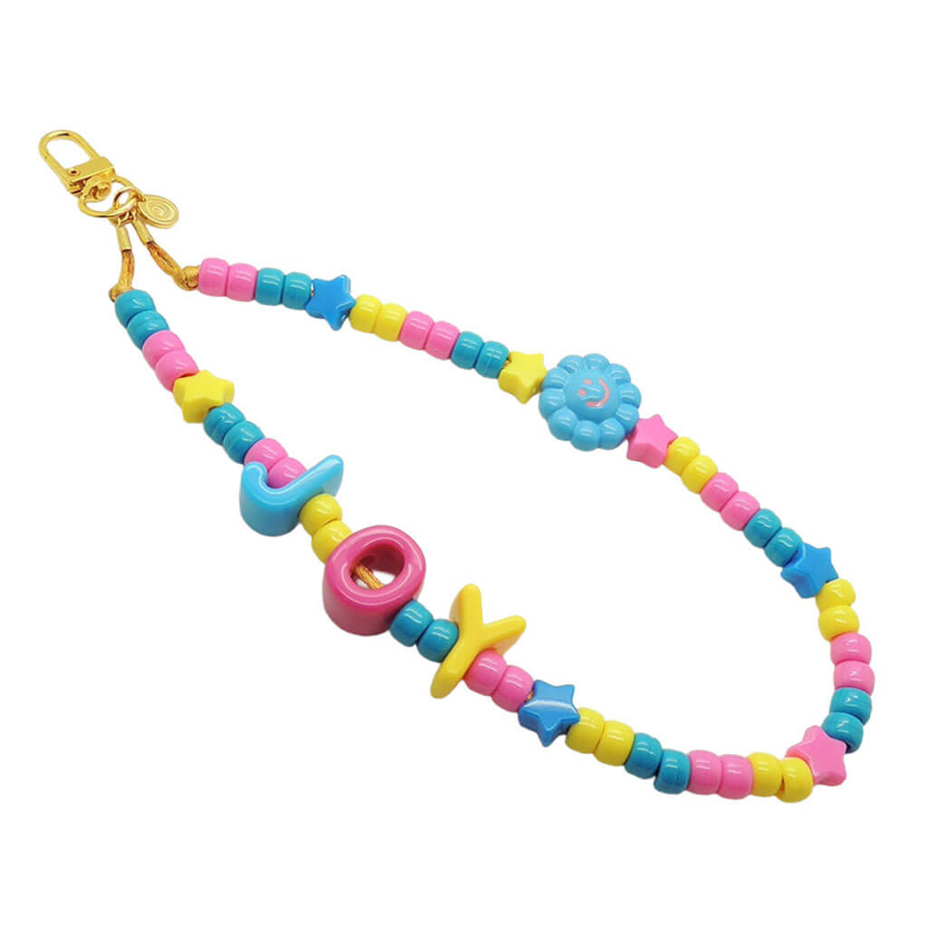 Dana Levy colourful acrylic beaded phone charm strap with alphabet letters reading joy and a blue smiley flower charm with a gold clasp on a white background.