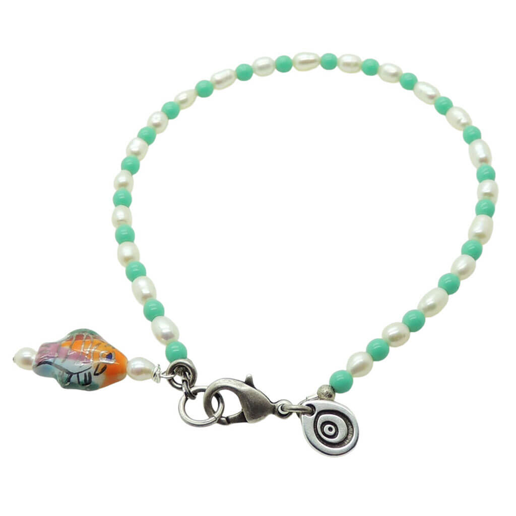 Dana Levy porcelain fish charm freshwater pearl glass bead mix anklet with aqua glass beads and antique silver clasp on a white background. 