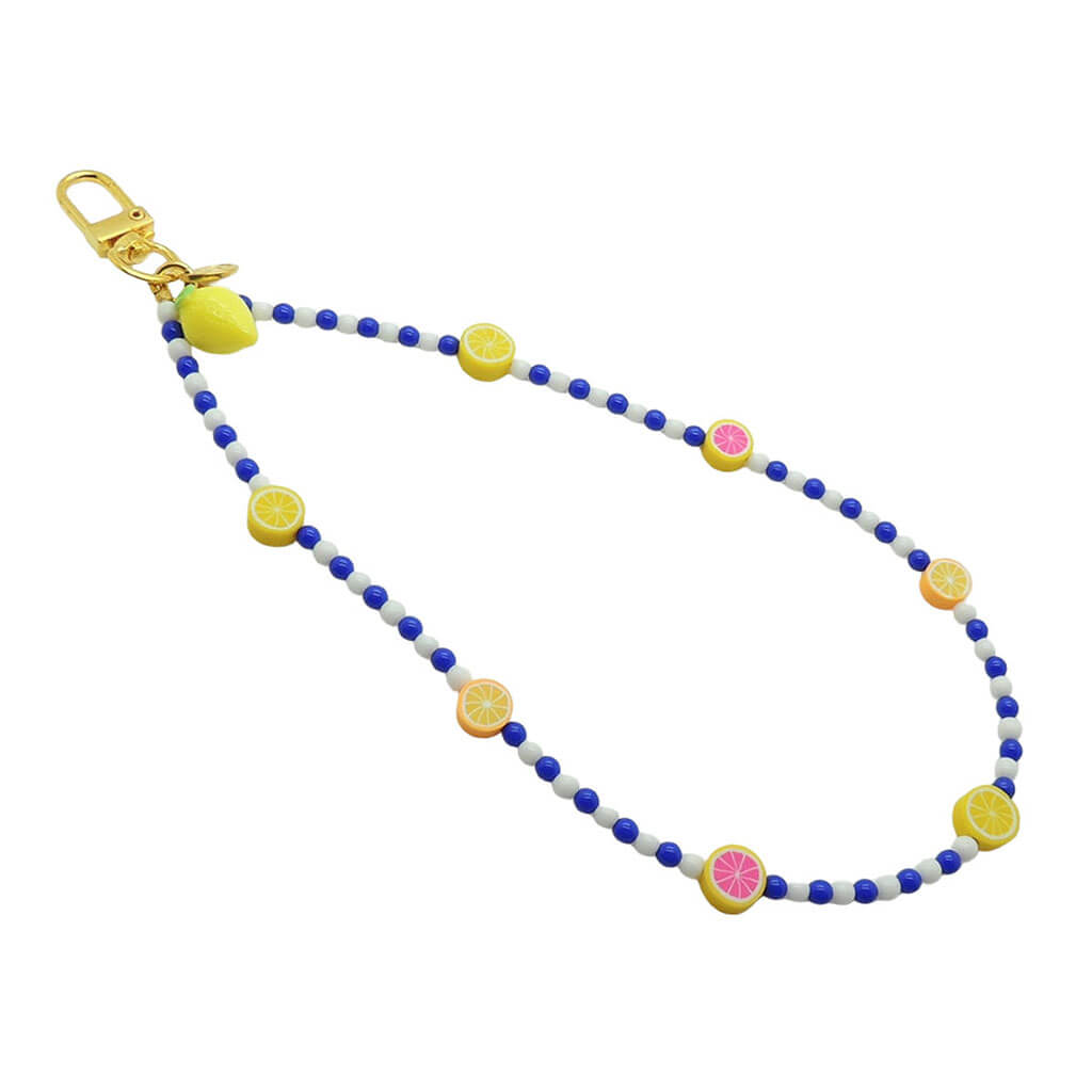 Dana Levy Sicilian tutti frutti charm two tone glass bead phone wristlet strap with fruit mix, royal blue and white glass bead mix on a white background.