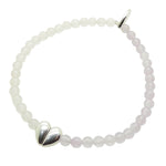 Dana Levy silver plated split heart charm gemstone bracelet in rose quartz and lavender amethyst on a white background. 
