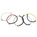 Dana Levy set of five split heart charm gemstone beaded bracelets on a white background.