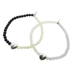 Dana Levy pair of two silver plated split heart charm gemstone bracelets on a white background. 